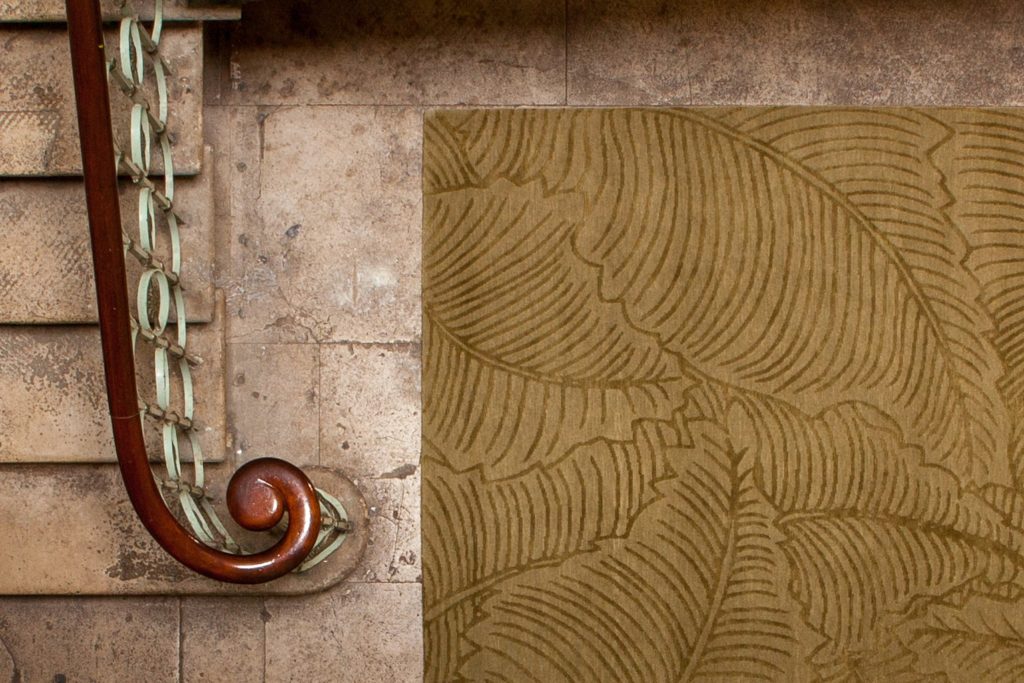 Detailed folium rug at a residential townhouse, London