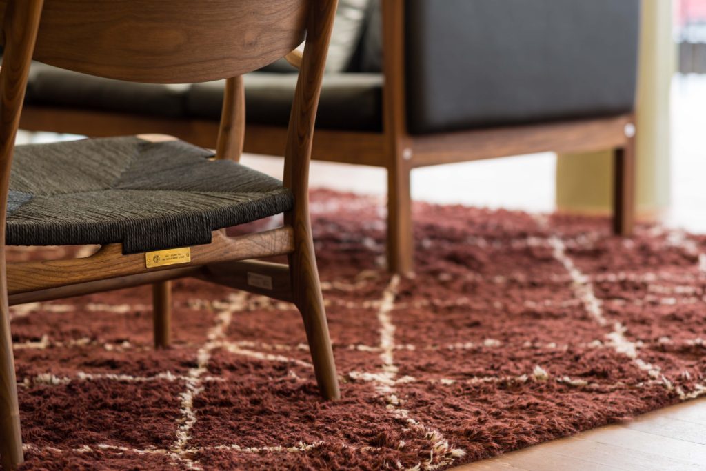 Detailed red rug at The Department Store, London